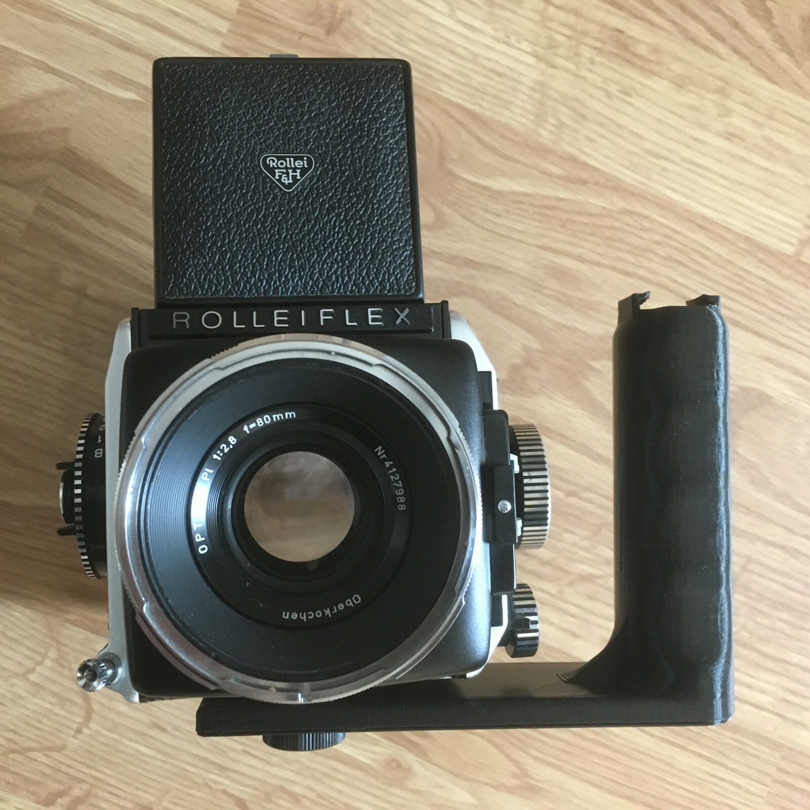 Poignée Rolleiflex SL66 pour soulager le poignet lors des prises de vue 6x6