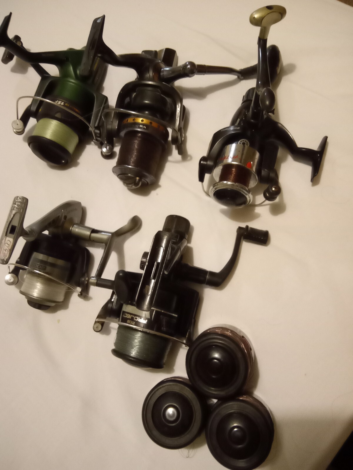 5 USED FISHING REELS eBay