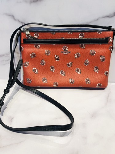 coach purse with leather flowers