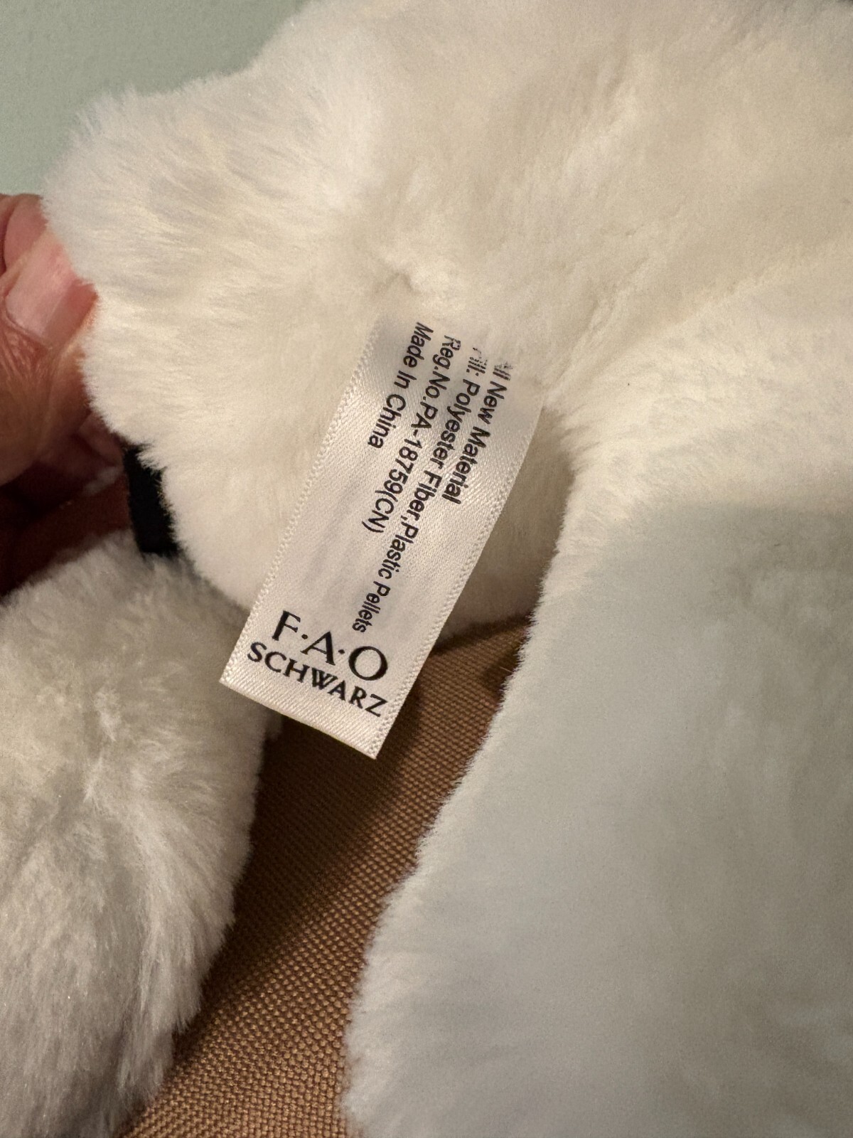 F.A.O. Schwarz Black & White Plush Dog 13 in Long