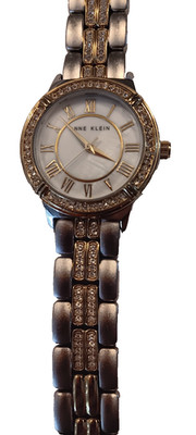 Anne Klein Gold & Silver Rhinestone Womans Watch with 1 3/8 inch face # Y121E.