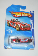 HOT WHEELS 2010 FASTER THAN EVER 03/10 - TRIUMPH TR6 METALLIC RED