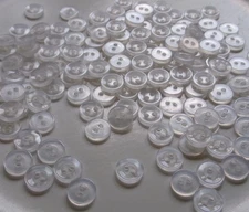 LOT OF 150  WHITE COLOR 2 HOLE 3/8th  INCH RE BUTTONS, NEW
