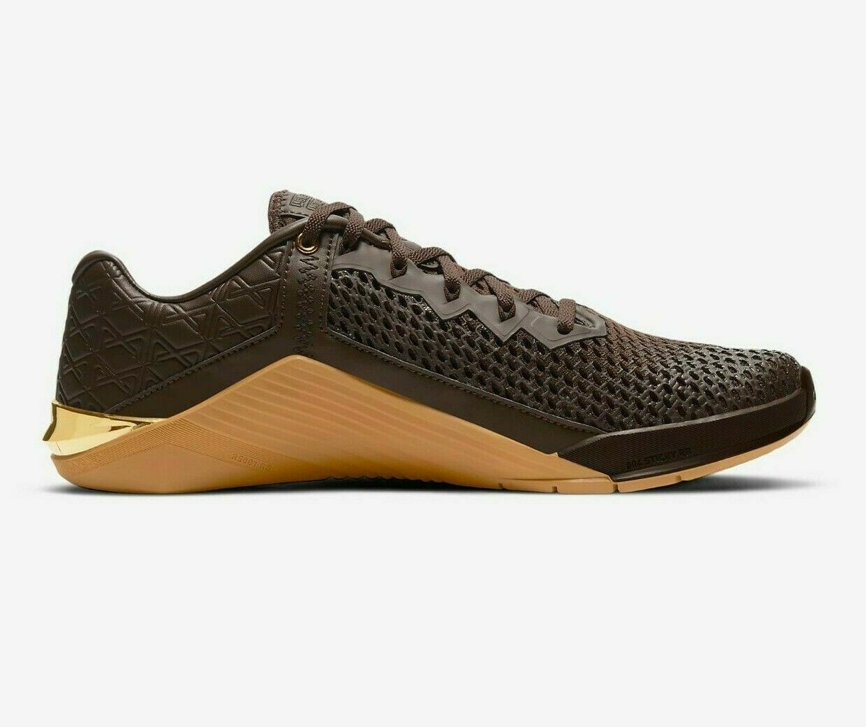 nike metcon dourado
