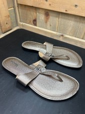 Michael Kors Metallic Gold Leather Upper Thong Sandals With MK Logo Charm...