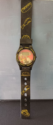 NOT WORKING/ERSATZTEILE - The Simpsons Kelloggs Black Armbanduhr - Homer (2002)