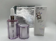 NIB ABOUT FACE BEAUTY LIGHT LOCK HIGHLIGHT FLUID IN SUNSTRUCK Full Size w/Bag!!