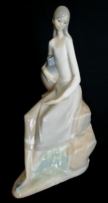NAO by LLADRO ''GIRL SITTING ON ROCKS WITH JUG'' 9.5  TALL PORCELAIN FIGURINE # 31