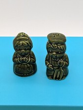 Vintage  Man and Woman Salt & Pepper Shakers. Green coat ceramic.