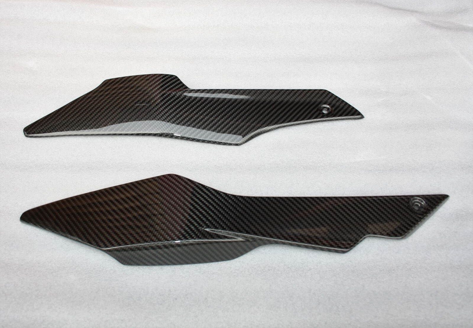 Sabot carbone Speed Triple 1200 RS pour une protection aérodynamique optimale du moteur