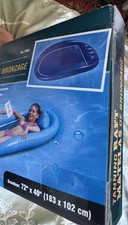 VINTAGE INFLATABLE TANNING RAFT BY WORLD FAMOUS SALES OF CANADA BRAND NEW!!