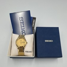 Seiko Quartz Day/Date Gold-Tone Analog Dress Watch 34mm w Box Papers Manual