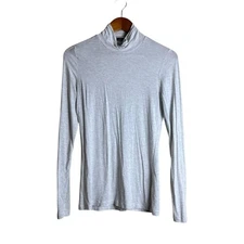 Babaton light grey turtle neck knit top. Size medium