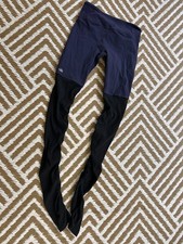 178 Alo Yoga High-Waist Goddess Leggings in a rich navy and black colorblock sm
