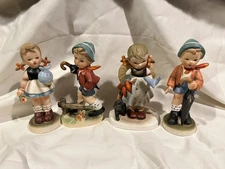 Vintage UCAGCO Ceramic Figurines - Set of 4