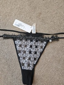 BRAND NEW LISE CHARMEL , BLACK & WHITE STRING THONG SIZE LARGE 