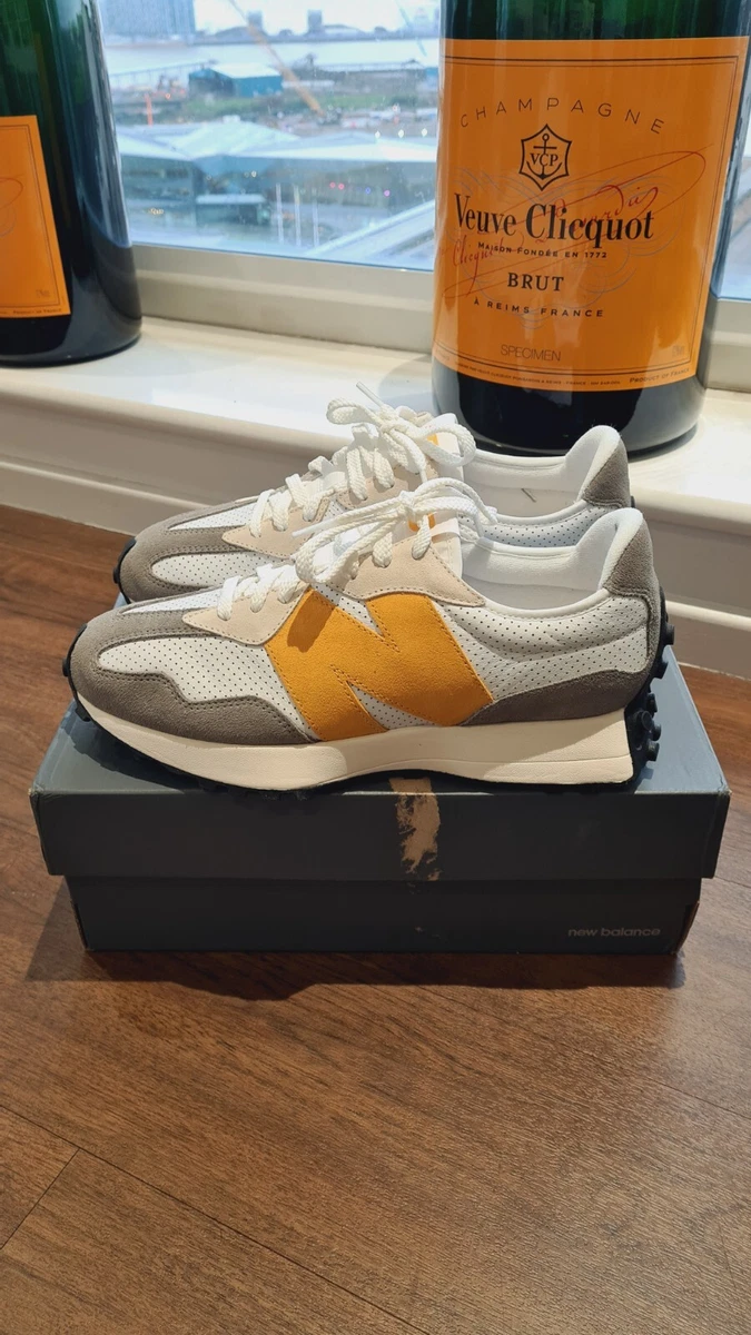 New balance grey sale yellow