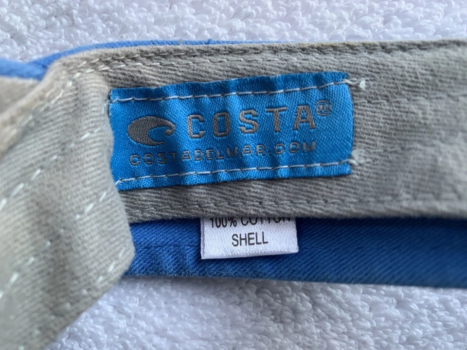 Visera Costa Del Mar para mujer azul agua blanco bordado logotipo tirantes algodón Foto 3 de 4