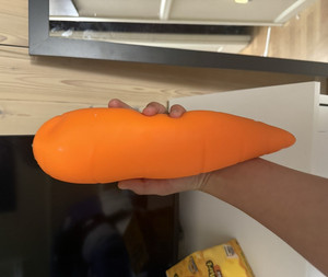 Orange Carrot-Shaped Foam Squeeze Stress Reliever Toy, Slow Rising, 10 in