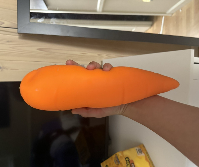 Orange Carrot-Shaped Foam Squeeze Stress Reliever Toy, Slow Rising, 10 in
