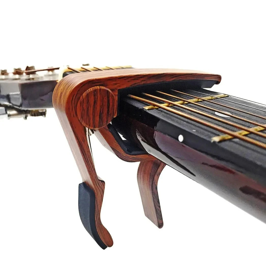 Miwayer Capotasto per chitarra acustica ed elettrica finitura palissandro con 5 plettri foto 5