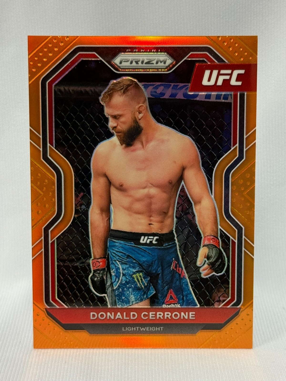 2021 Panini Prizm Donald Cerrone #12 ORANGE PRIZM 10/99