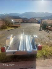 remorque moto 1 rail/etat neuf/planchet rajoutè/roue de secours neuf/antivol /