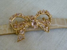 Bracciale Les Nereides in pelle beige con fiocco dorato e cristalli rosa