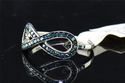 Alianza de boda infinita de topacio simulado corte redondo de 2 quilates chapada en oro blanco de 14 k Foto 2 de 3