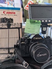 Canon A-1 35mm SLR Camera FD 35mm f/3.5 SC Lens Tested Brochure Strap Caps SHARP