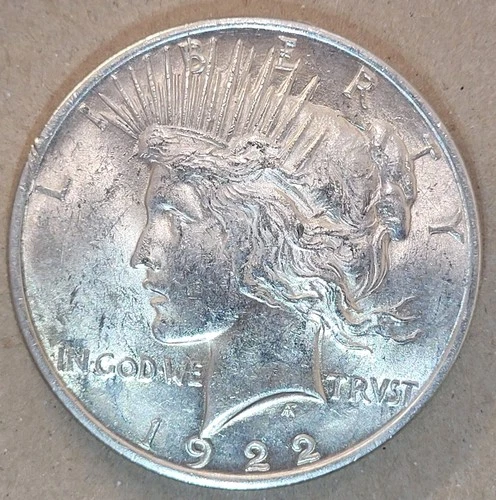 1922 Peace Silver Dollar Brilliant Uncirculated MS Quality W/Luster.  Nice Coin!