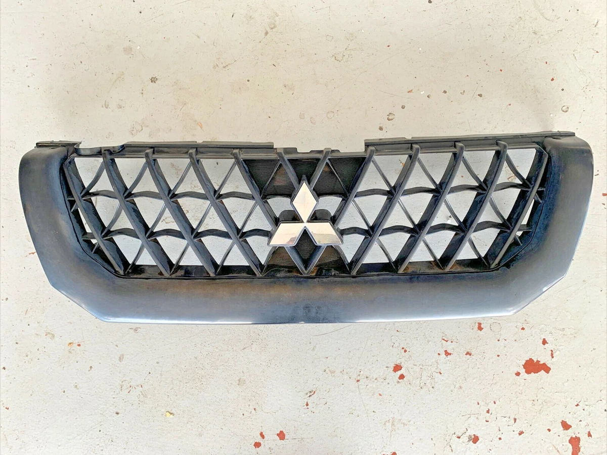 2001-2004 Mitsubishi Montero Sport Front Bumper Grille w/ Emblem  