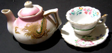 Vintage Mini Miniature Tea Pot Featuring a Dragon Motif and Tea Cup with Saucer