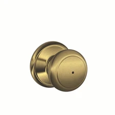 Schlage Andover Door Knob with Bed and Bath Lock in Brass: Brand New, In Box!