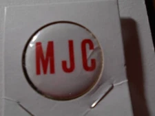 1-1/4" M J C unknown office and location cello pinback button
