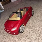 Red 2003 vintage leopard print seats convertible Barbie car