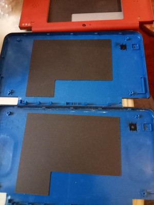 Nintendo DSi XL 25th Anniversary Edition with New Mario Bros. Red