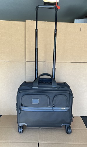 tumi deluxe 4 wheeled laptop case brief