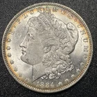 1884 O Morgan Silver Dollar $1 Uncirculated Coin Peripheral Toning