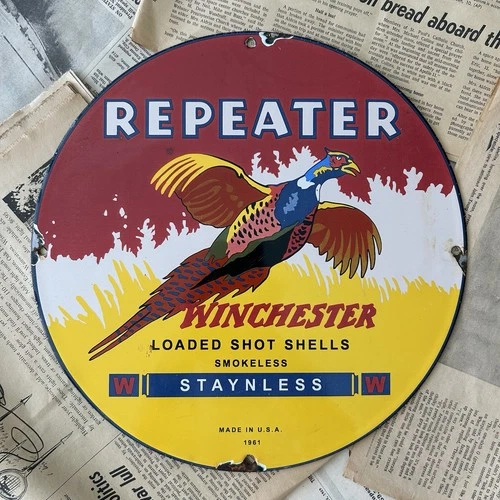 VINTAGE 1961 WINCHESTERREPEATER SHOTGUN SHELLS 12INCH PORCELAIN ENAMEL SIGN