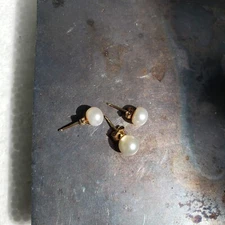 4 (one not pictured but is included) gold and pearl studs vintage