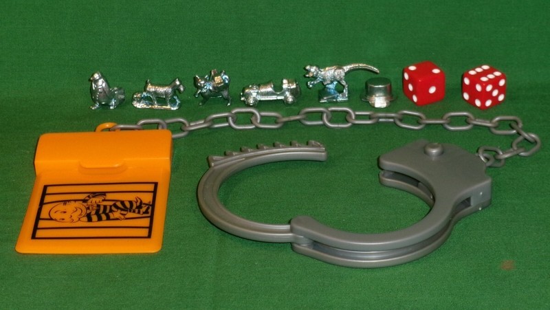9 Pieces Monopoly Cheaters Edition 6 Tokens, 2 Dice, Handcuffs Board Game Hasbro