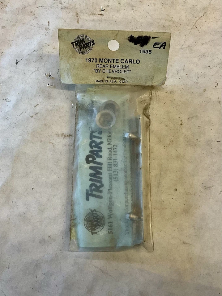 Chevrolet Monte Carlo 1970 emblema trasero de Chevrolet Trim Parts NOS C14 Foto 2 de 3