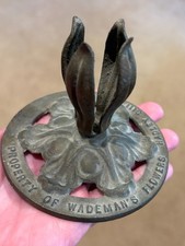 Antique metal advertising vase holder for WADEMAN'S FLOWERS (Houston, Texas)