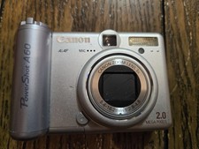 Canon PowerShot A60. For Parts. Battery Compartment Had Corroded Batteries