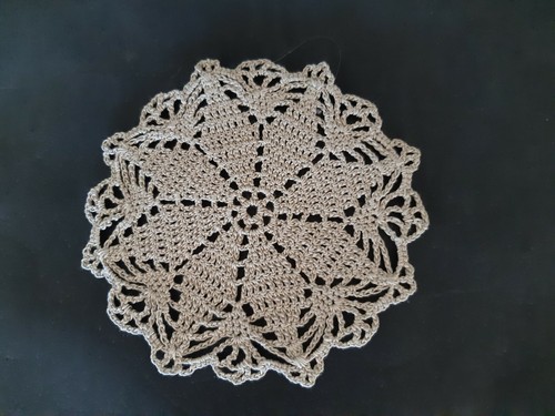Vintage small round ecru/brown hand crocheted doily.  - Picture 1 of 3