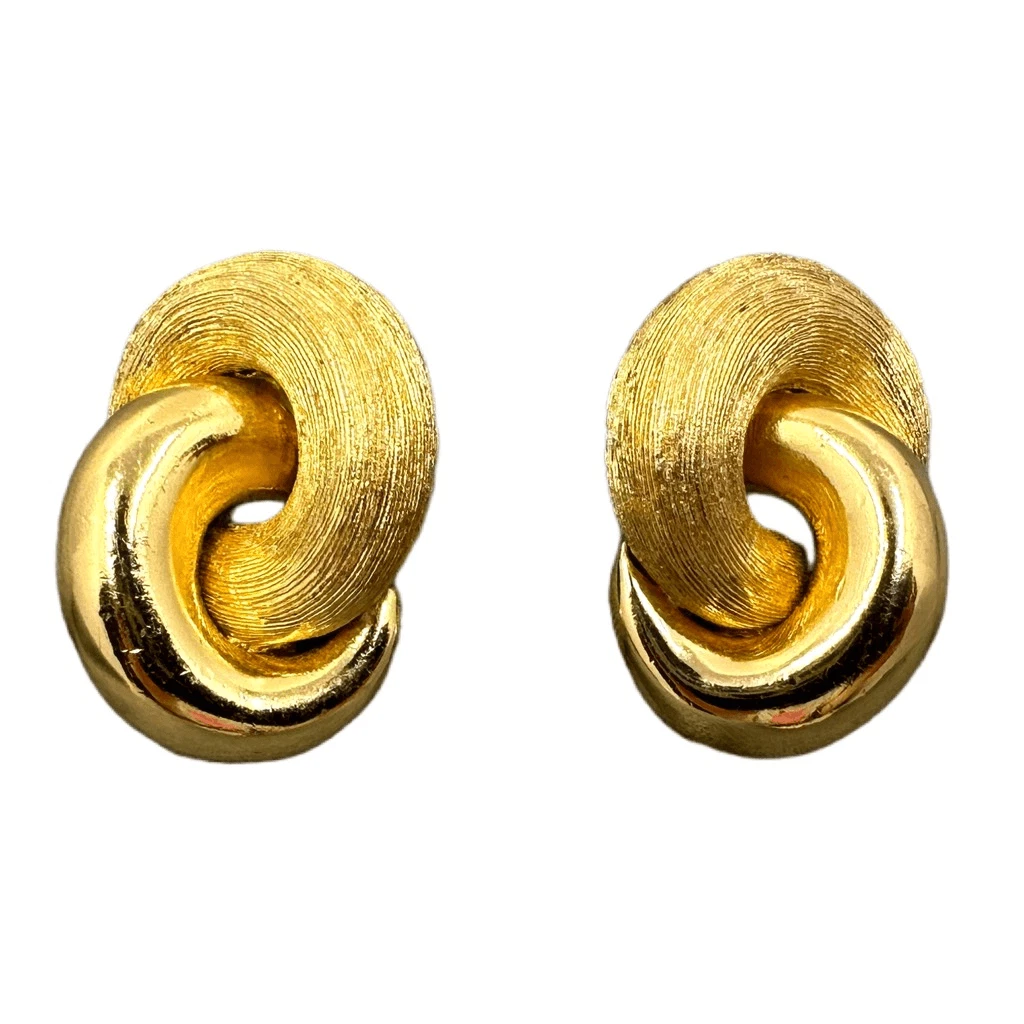 Boucles d’oreilles clips vintage Christian Dior ton or tourbillon infini 1,25”x,75” années 80