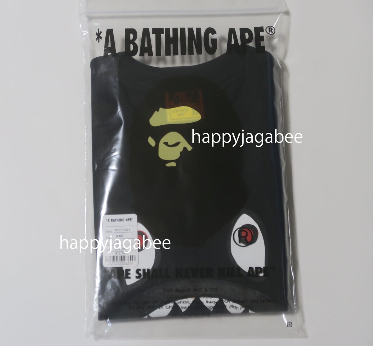 A BATHING APE Men's BAPE x JOSHUA VIDES MILO SHARK TEE A BATHING APE Men's BAPE x JOSHUA VIDES MILO SHARK TEE