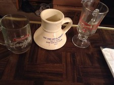 Assorted company mugs 