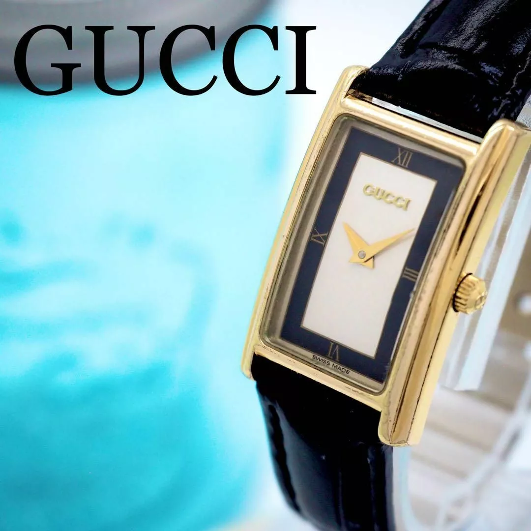 Montre femme Gucci 720 en boîte ceinture carrée 2600L